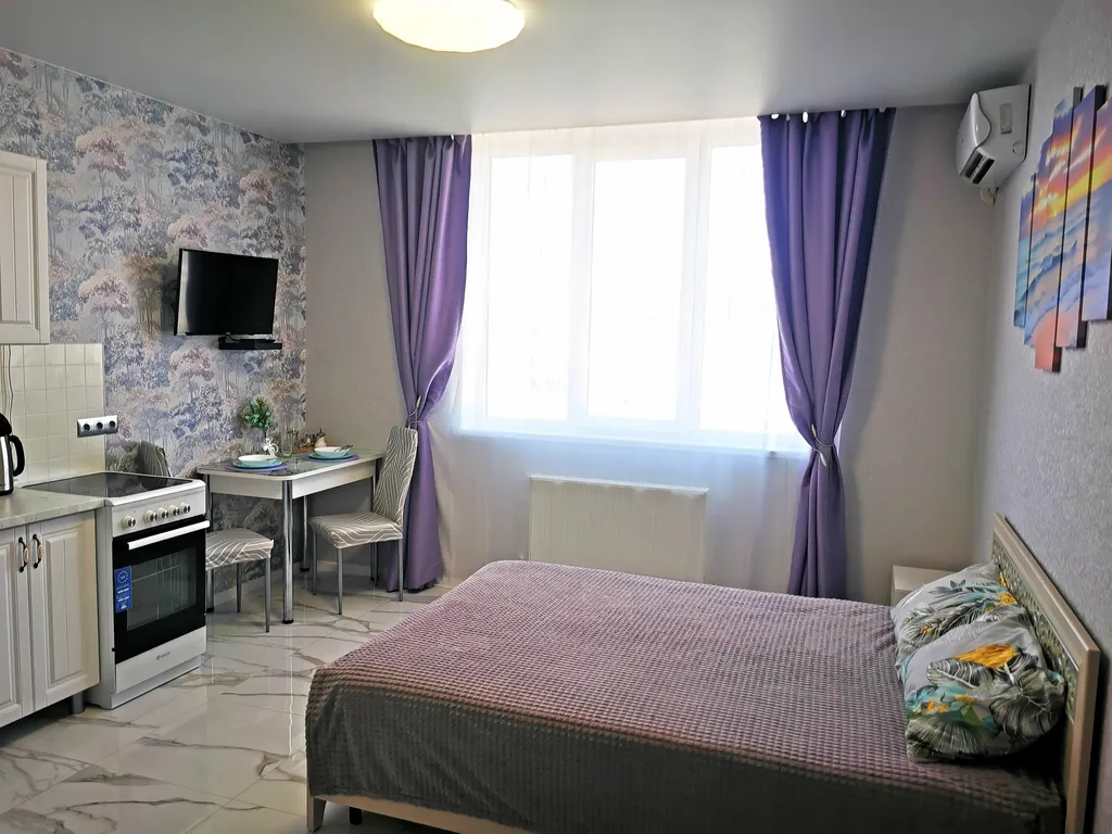 Уютная студия с боковым видом на море