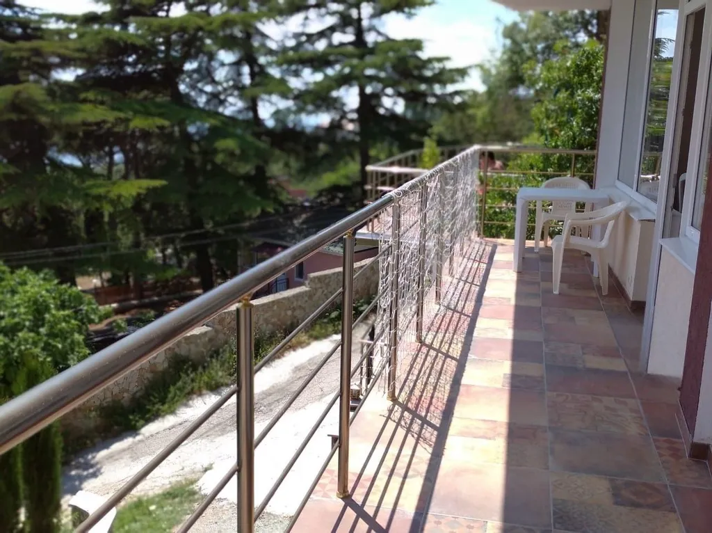 Люкс с видом на море и отдельной спальней 302