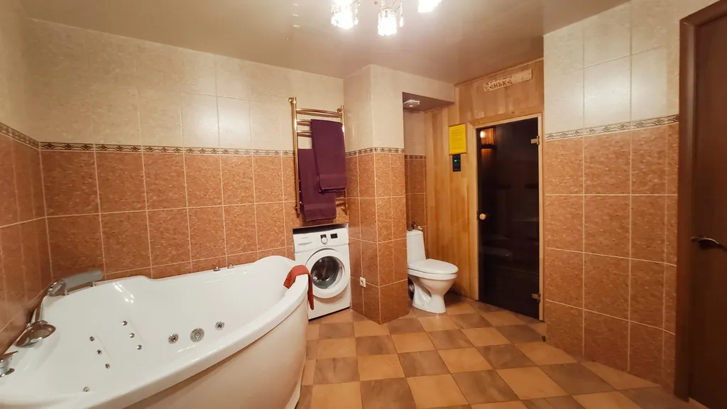 Квартира с джакузи и ИФК-сауной