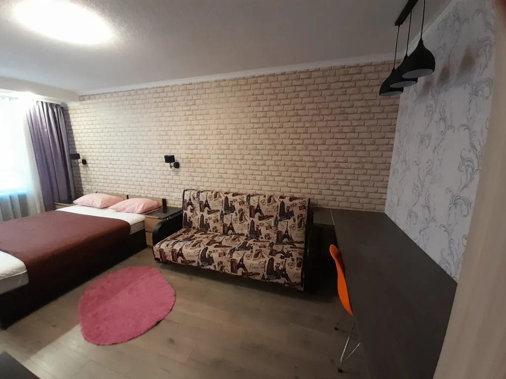 Квартира с балконом и видом на город и залив