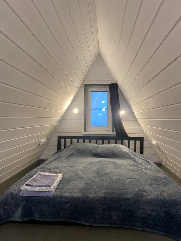 Треугольный дом