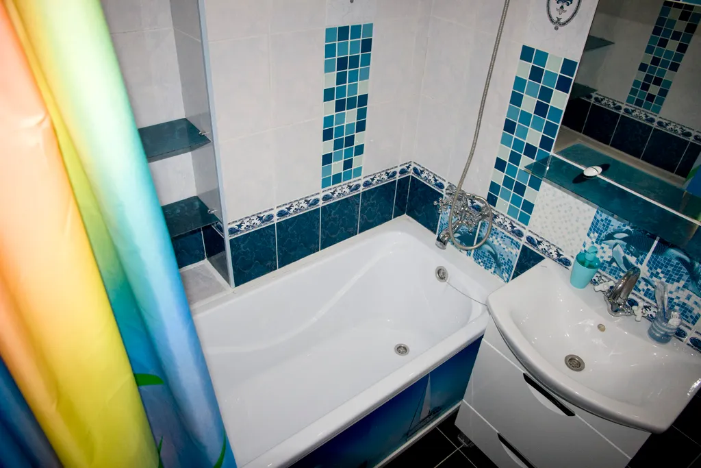 Однокомнатная с зеленым диваном и теплым полом