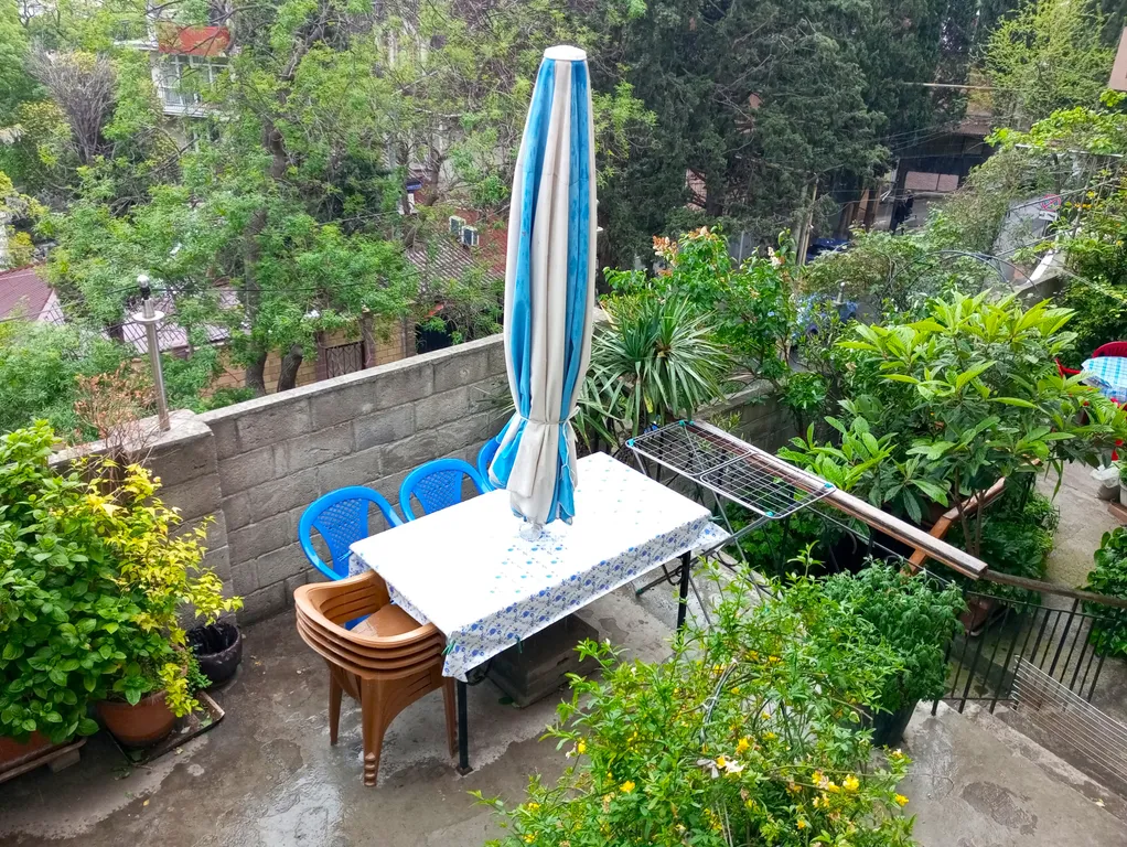 Квартира с мангальной зоной, гаражом и личным местом отдыха во дворе