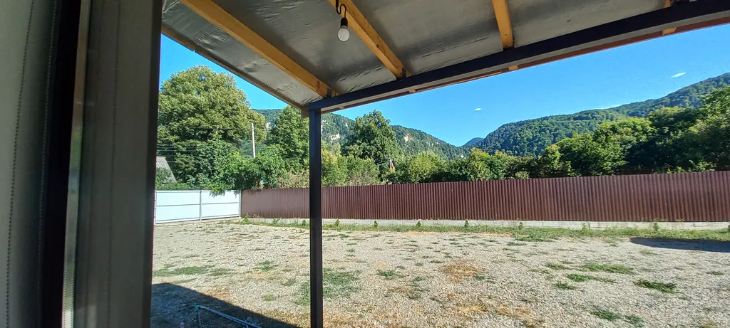 Гуамкаюг. Дом с купелью и видом на горы