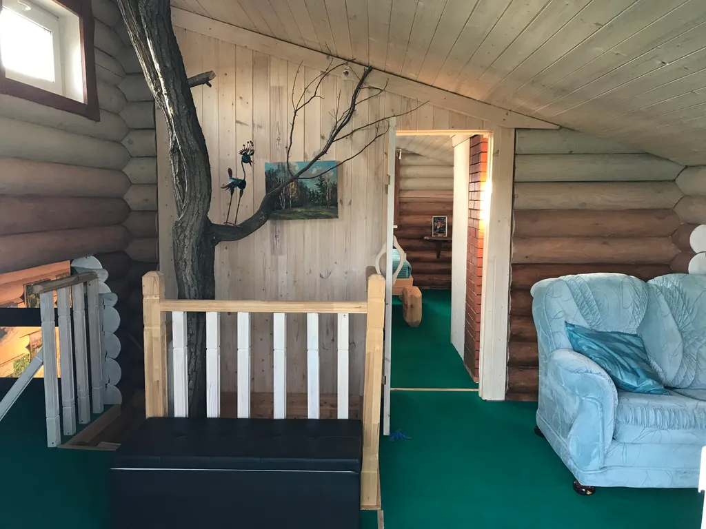 Дом из бревна Терем с сауной в черте города