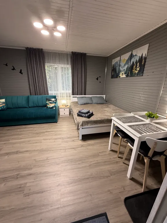 Квартира Уютная комната для четверых в деревянном таунхаусе у озера — Мезмай