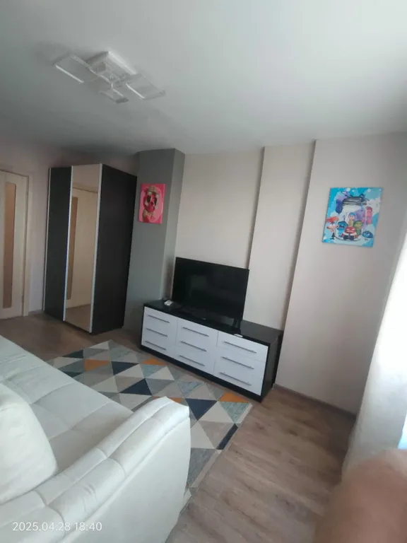 Уютная двухкомнатная квартира с видом на город и реку с 25 этажа