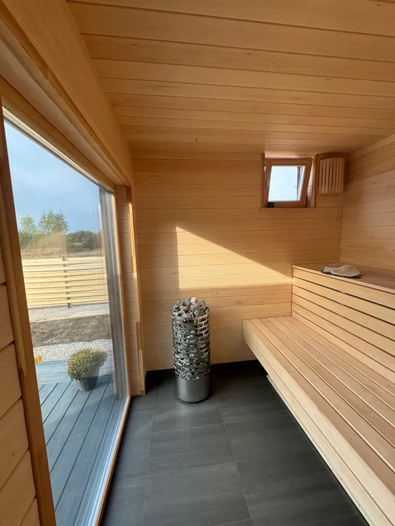 Домик с сауной и купелью у озера