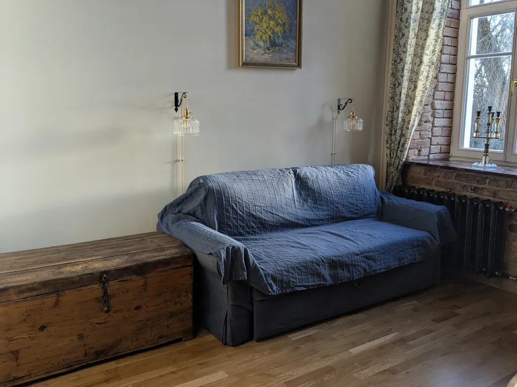 Уютная двухуровневая квартира-студия в доме XIX века