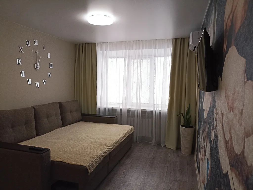 1-комнатная квартира в центре города с асфальтированной парковкой