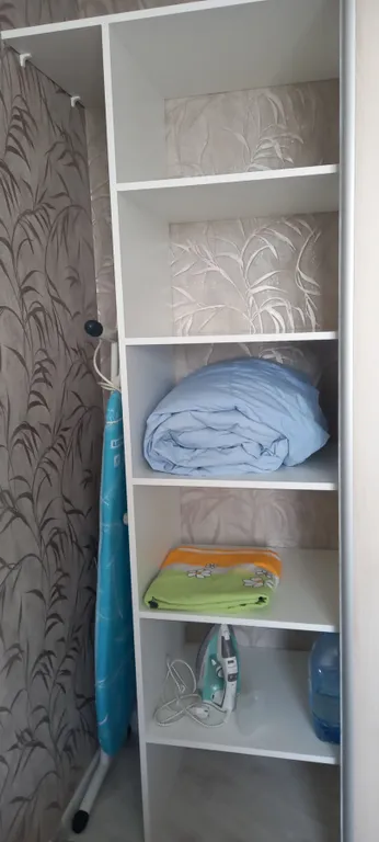 Квартира с магистральным фильтром, кухней-столовой и уютной спальней