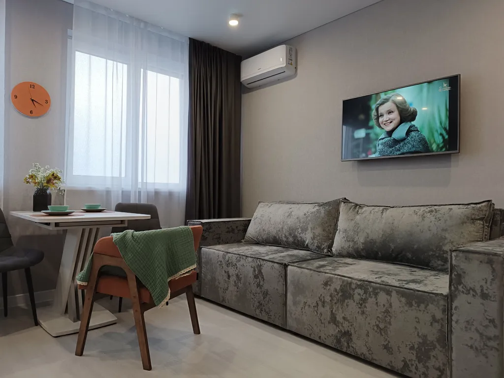 Просторная студия с 4-х местным размещением с видом на город