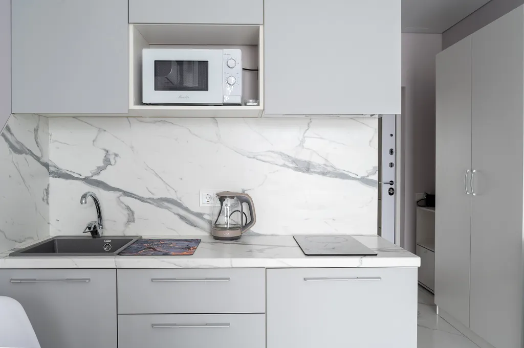 Светлая студия Real Apartments