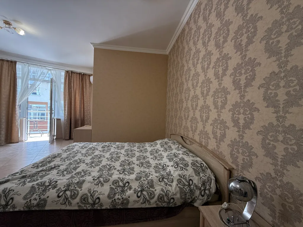 Студия с балконом зоной барбекю у моря