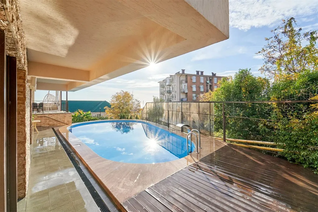 Квартира Двухуровневые апартаменты с выходом на теплый бассейн — Адлер