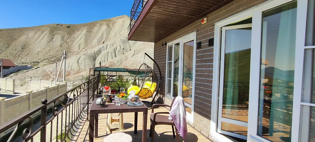 Апартаменты у моря с большой террасой, панорамным видом на море и горы