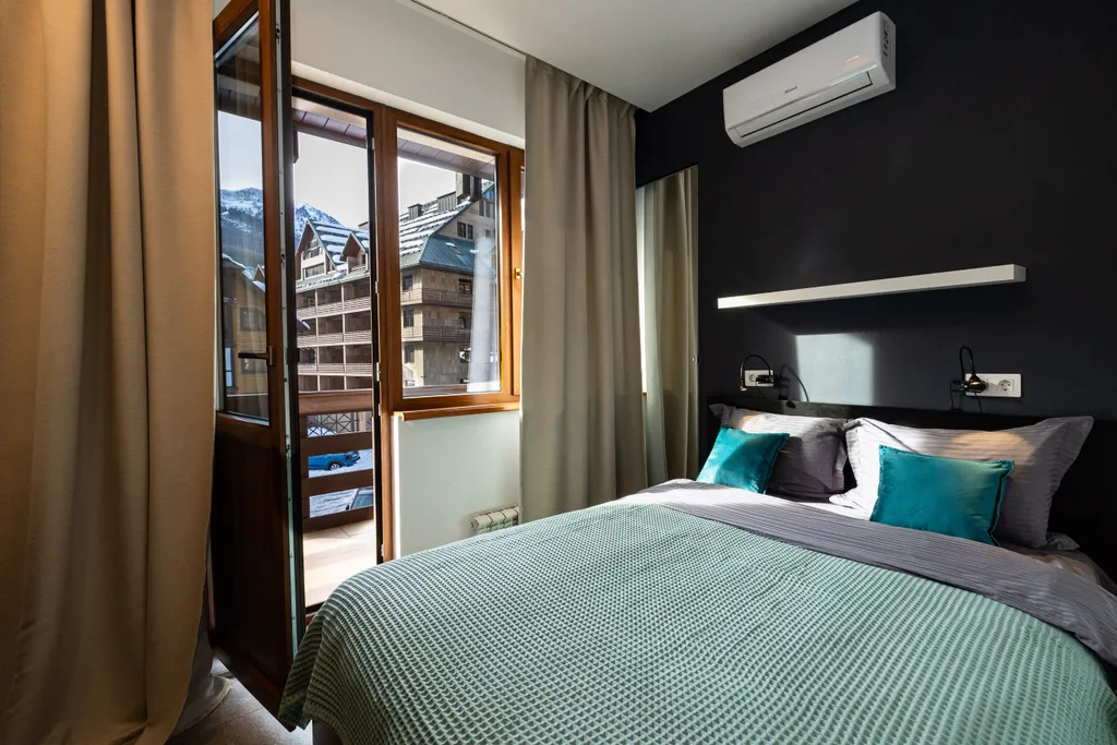 Современные дизайнерские апартаменты с потрясающим видом на горы