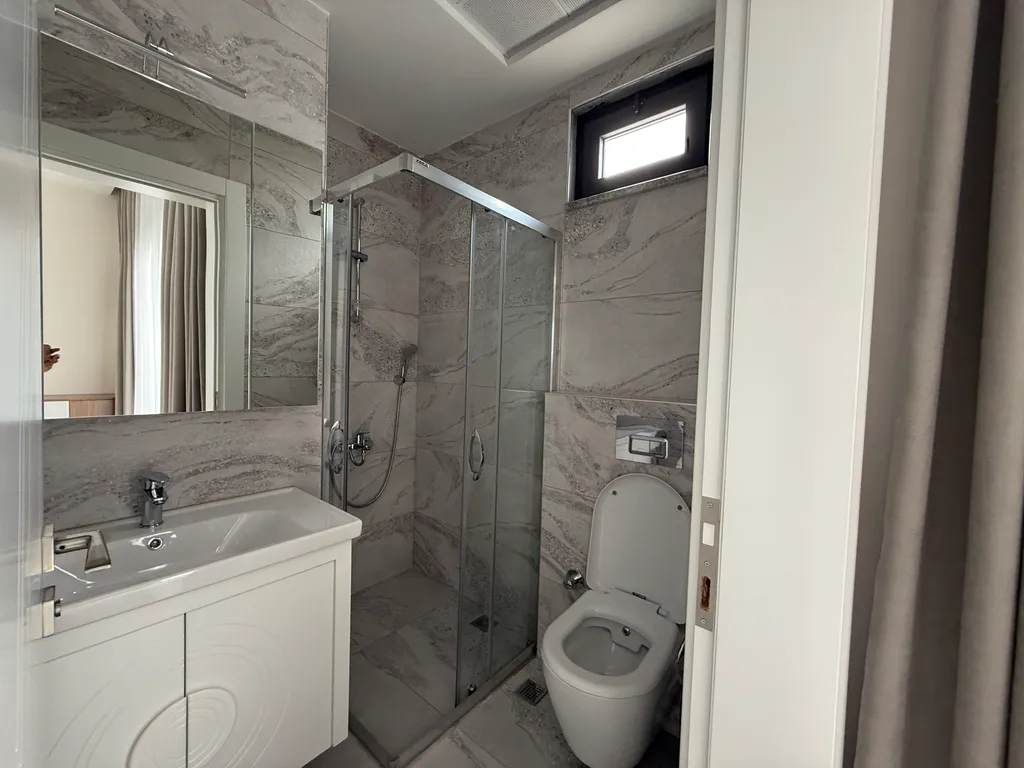 Новая квартира 2+1 в самом центре Махмутлара