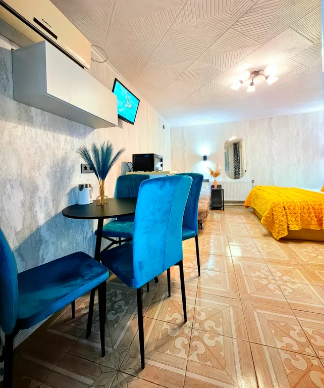 Уютная студия с индивидуальной терраской увитой виноградной беседочкой