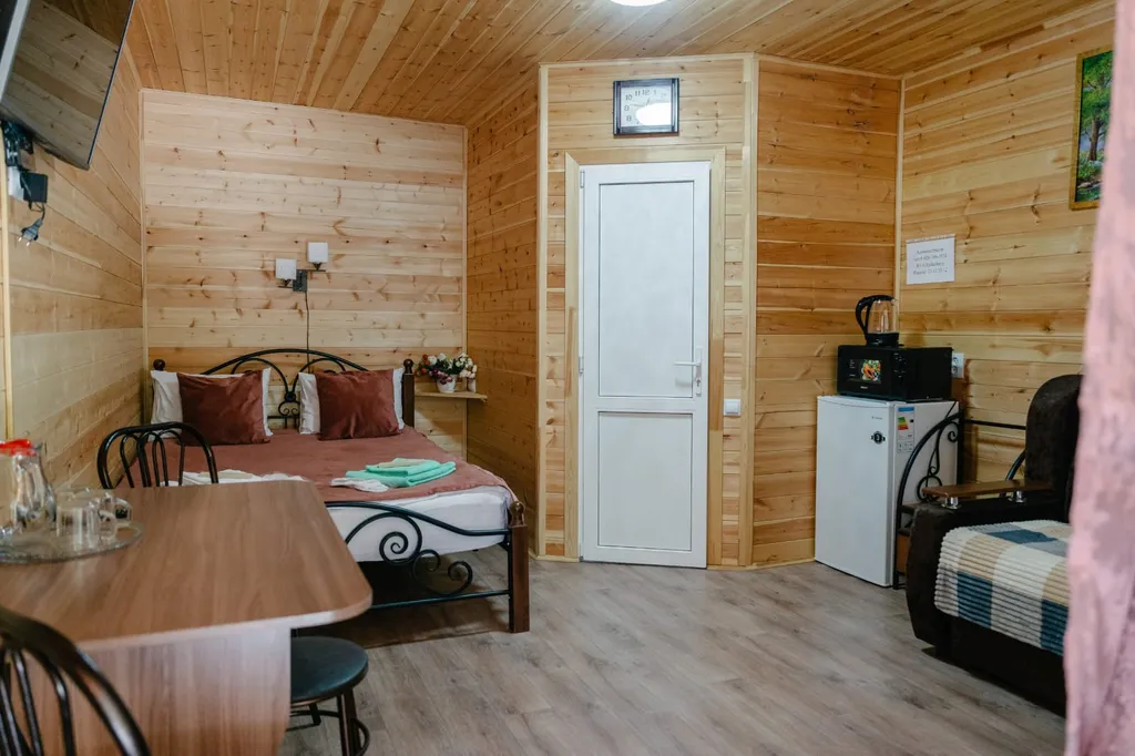 Домик номерного типа с общей террасой