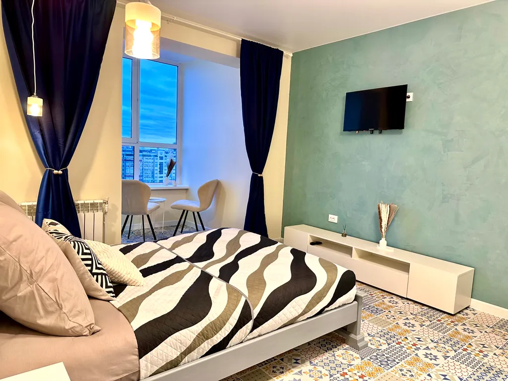 Светлые современные апартаменты в центре города