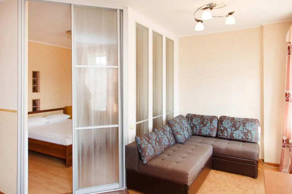 Уютная квартира с детской площадкой во дворе