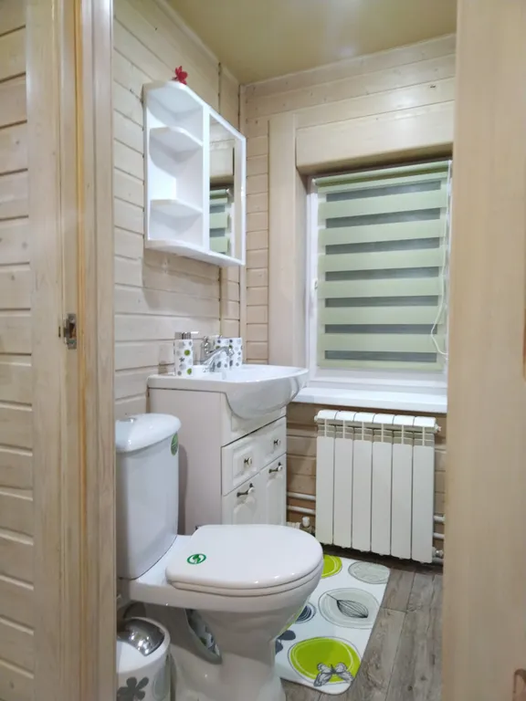 Уютный дом с беседкой в черте города