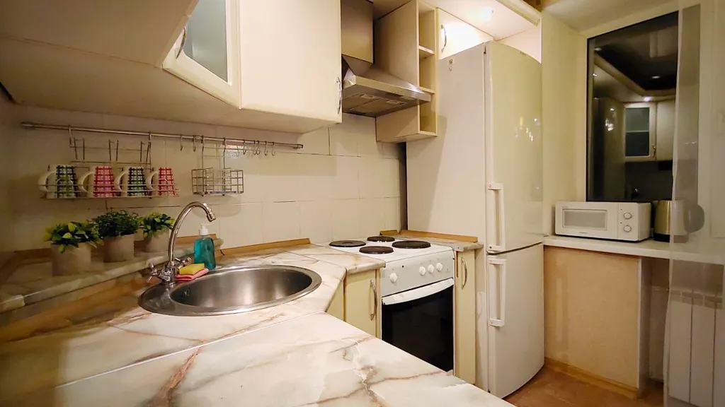 Уютная квартира у набережной и колеса обозрения