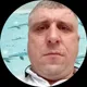 Николай