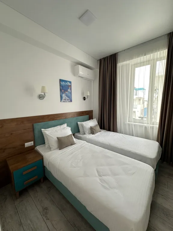 Двухуровневый полулюкс с зоной отдыха на крыше и видом на бассейн