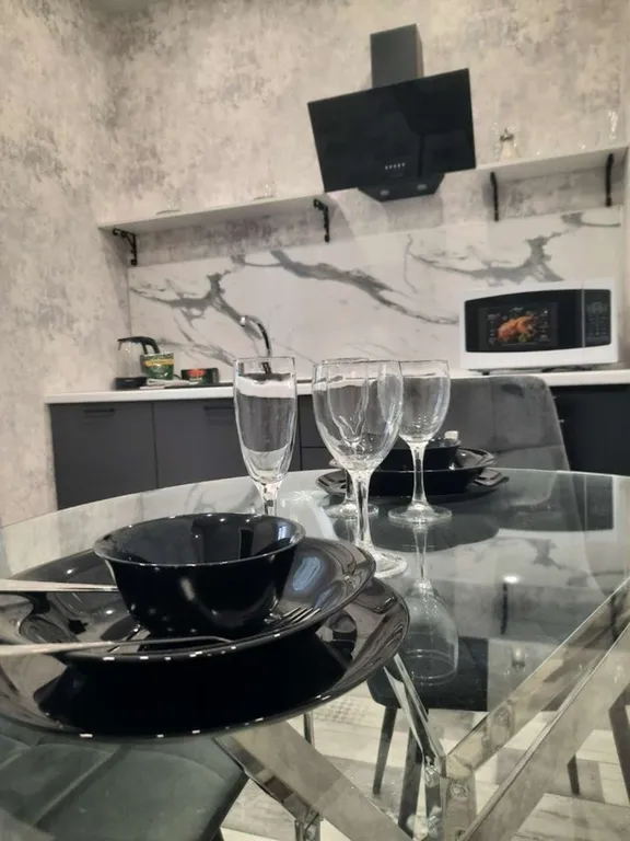 Уютная студия с видом на город