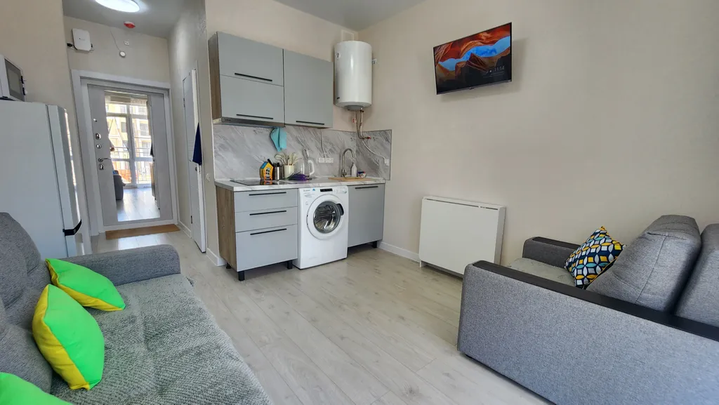 Уютная студия с видом на бассеин