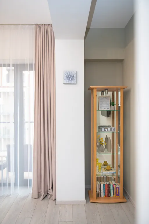 Уютные апартаменты с видом на колесо обозрения и город