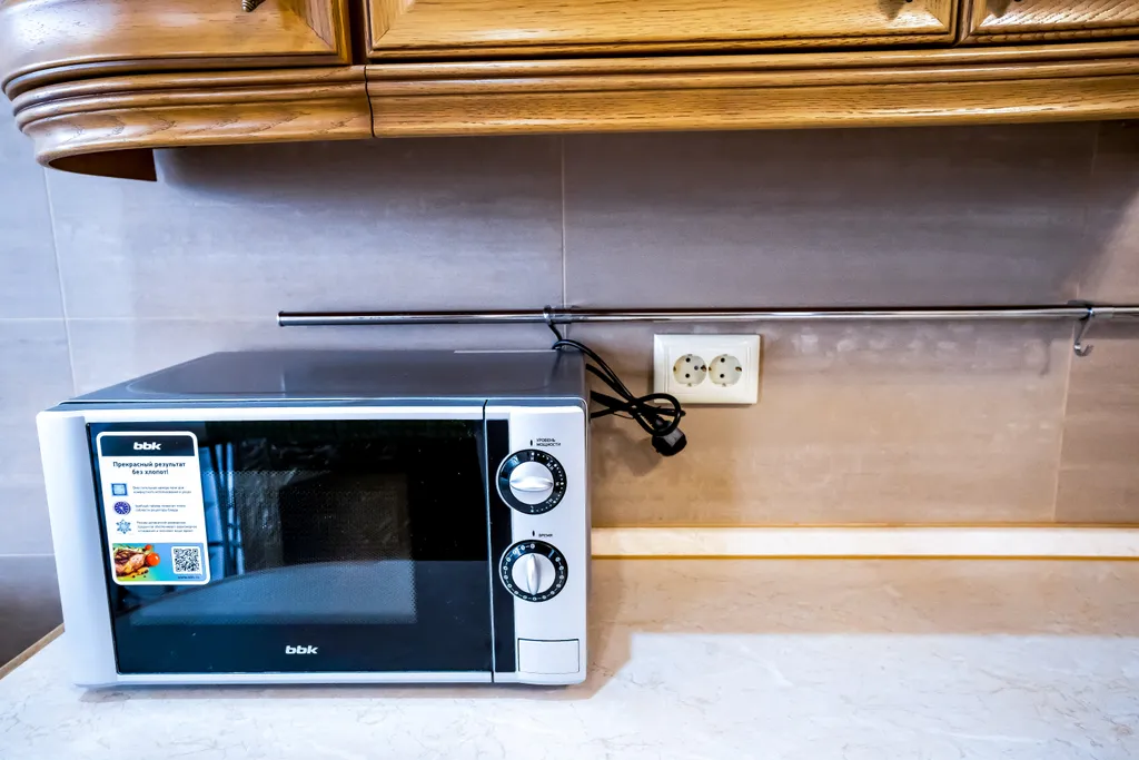 Номер делюкс с видом на бассейн, горы и аэропорт