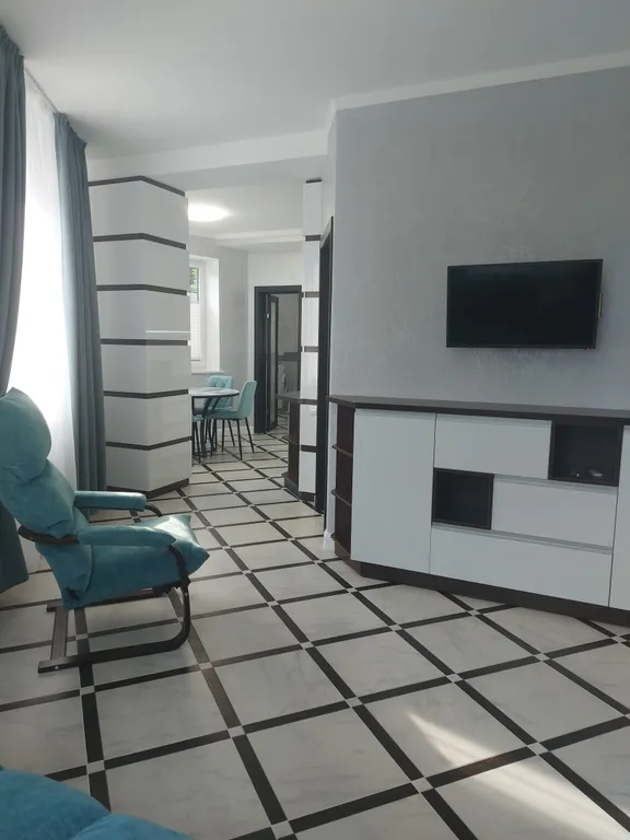 Современные апартаменты в гостевом доме с видом на море