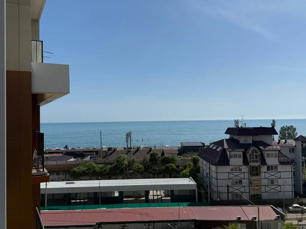 Уютная студия Шоколад у моря с балконом