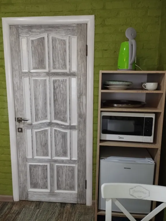 Уютный четырехместный номер с отдельными кроватями.