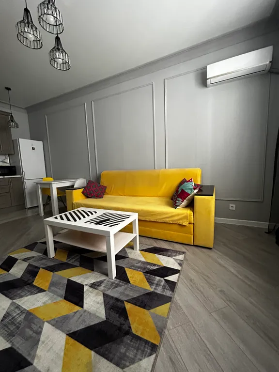 Квартира Дизайнерская квартира у моря с жёлтым диваном — Махачкала