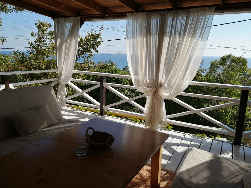 Коттедж с террасой с видом на море