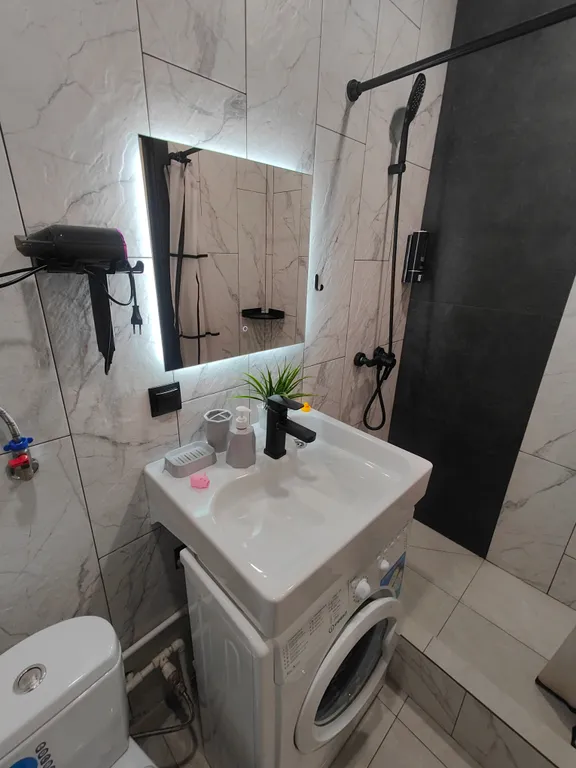 Квартира Уютная студия напротив университета и парка в центре Нефтяников — Омск