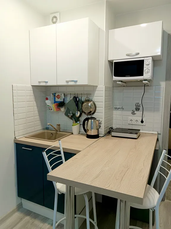 Уютная студия в новом доме с видовым балконом