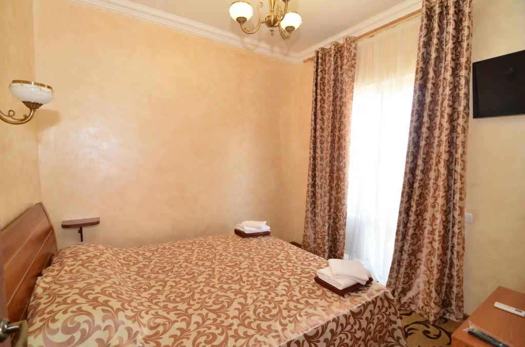 Четырехместный номер категории Люкс с террасой