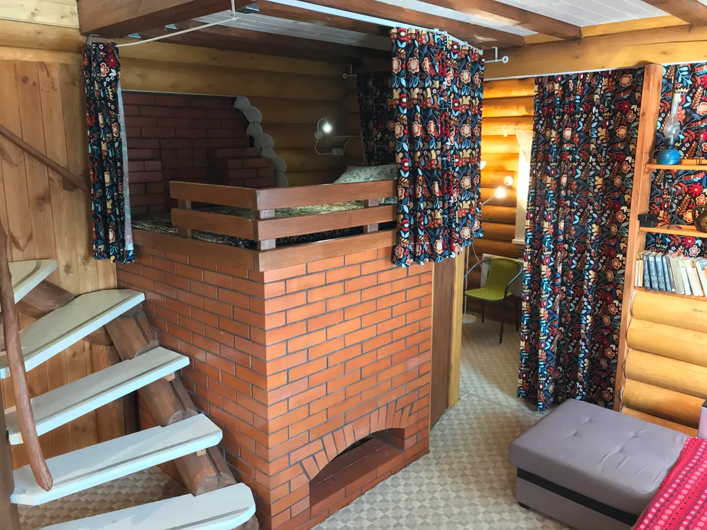 Дом из бревна Терем с сауной в черте города