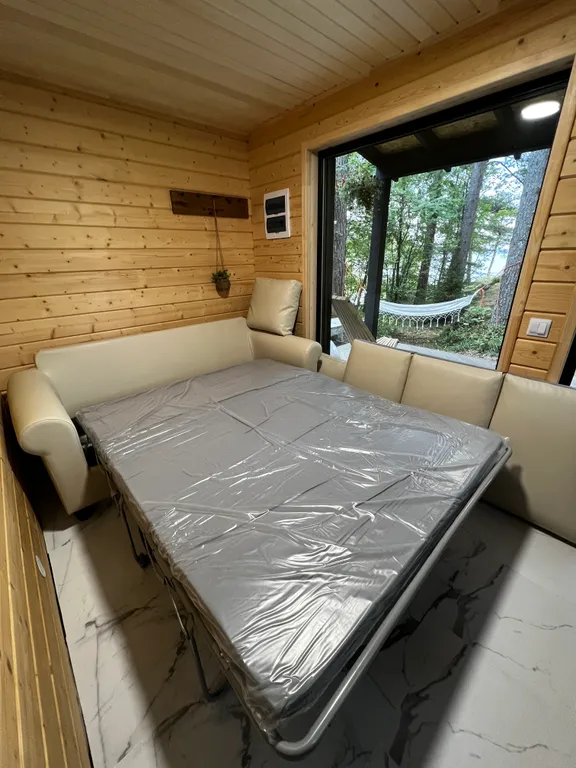 Стильный дом на берегу Ладожского озера с панорамным видом