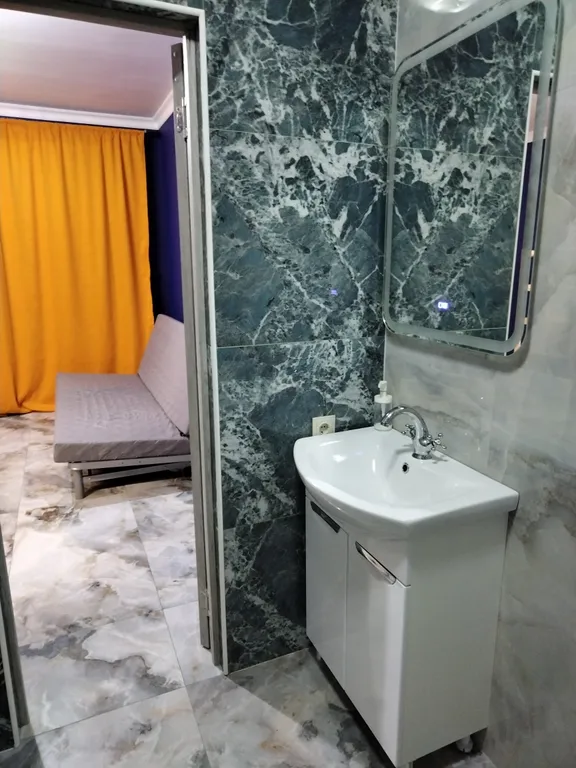 Уютная комната-студия в частном доме