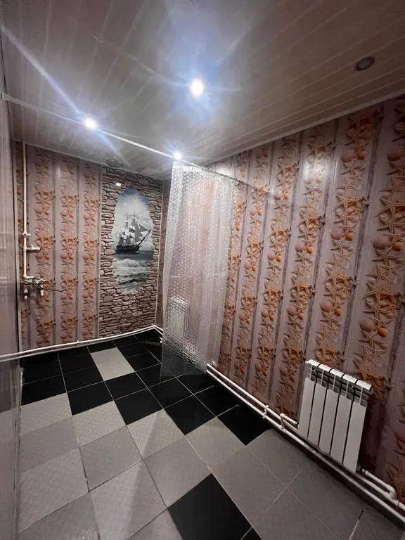 Уютный бревенчатый двухэтажный дом