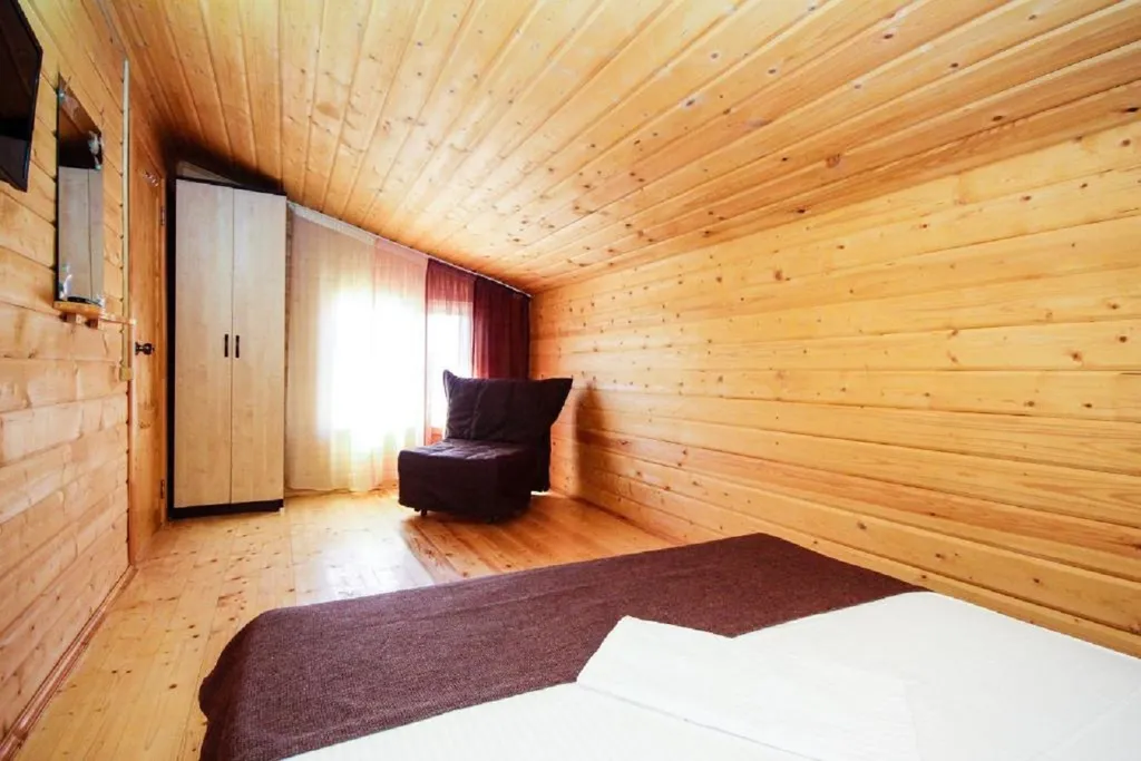 Двухэтажный дом из сруба