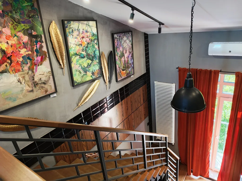 Атмосферная двухуровневая квартира с видом на Петропавловский парк