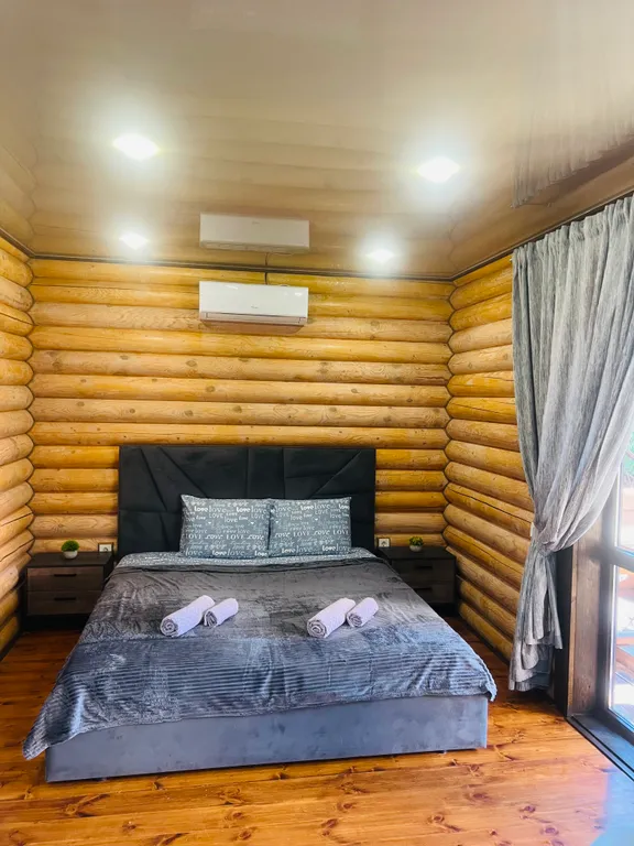 Семейные апартаменты Балдино в доме из сруба