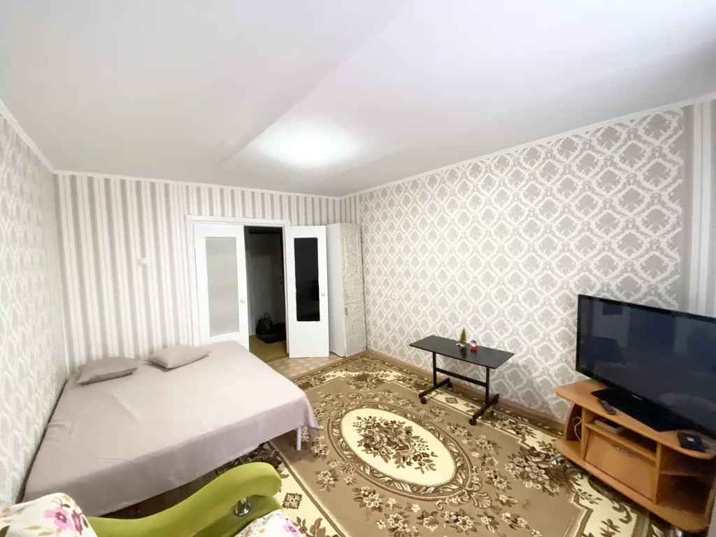 Квартира Уютная двухкомнатная квартира в Нефтяниках — Омск